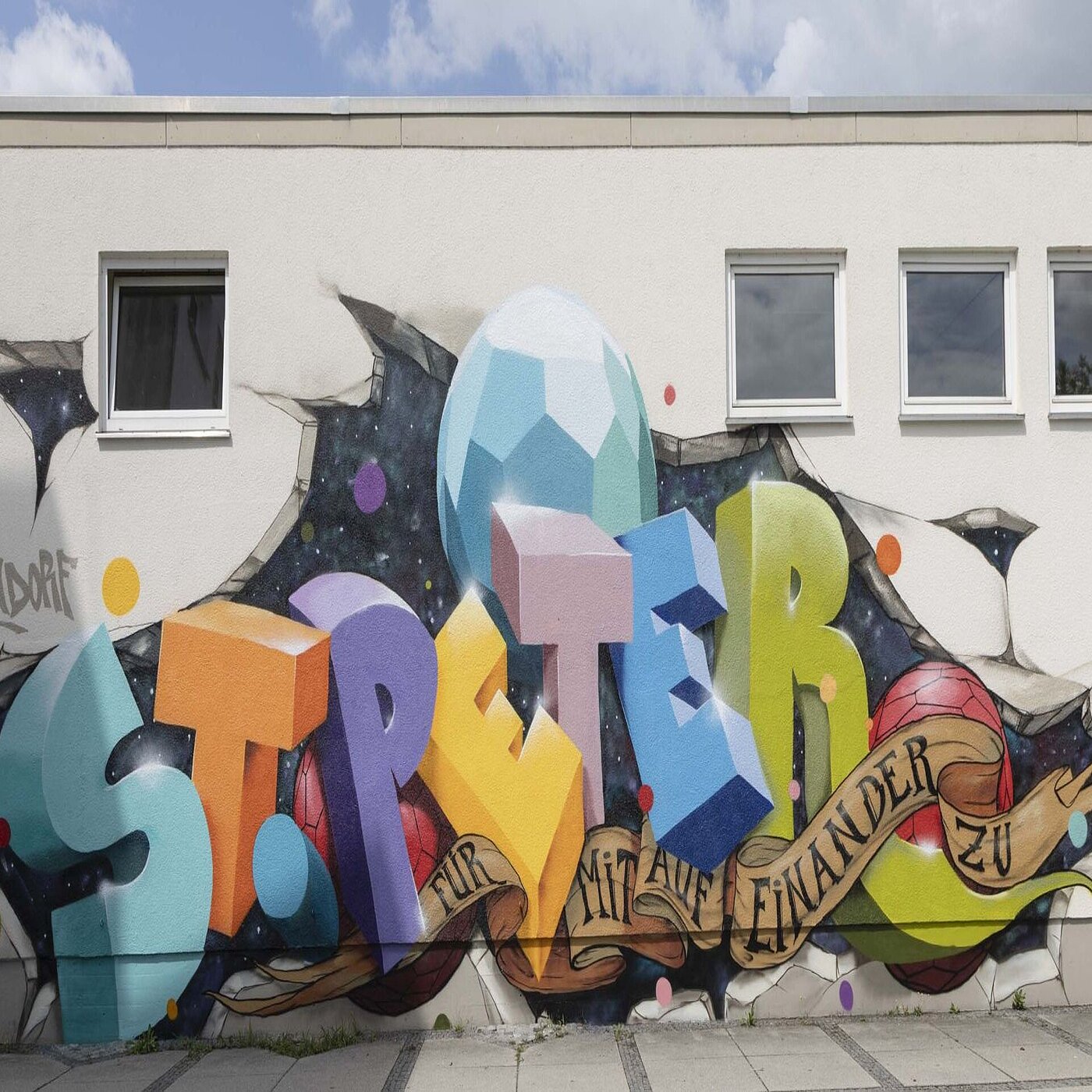 Wandkunstwerk Jeroo, Schriftzug Westerndorf St. Peter